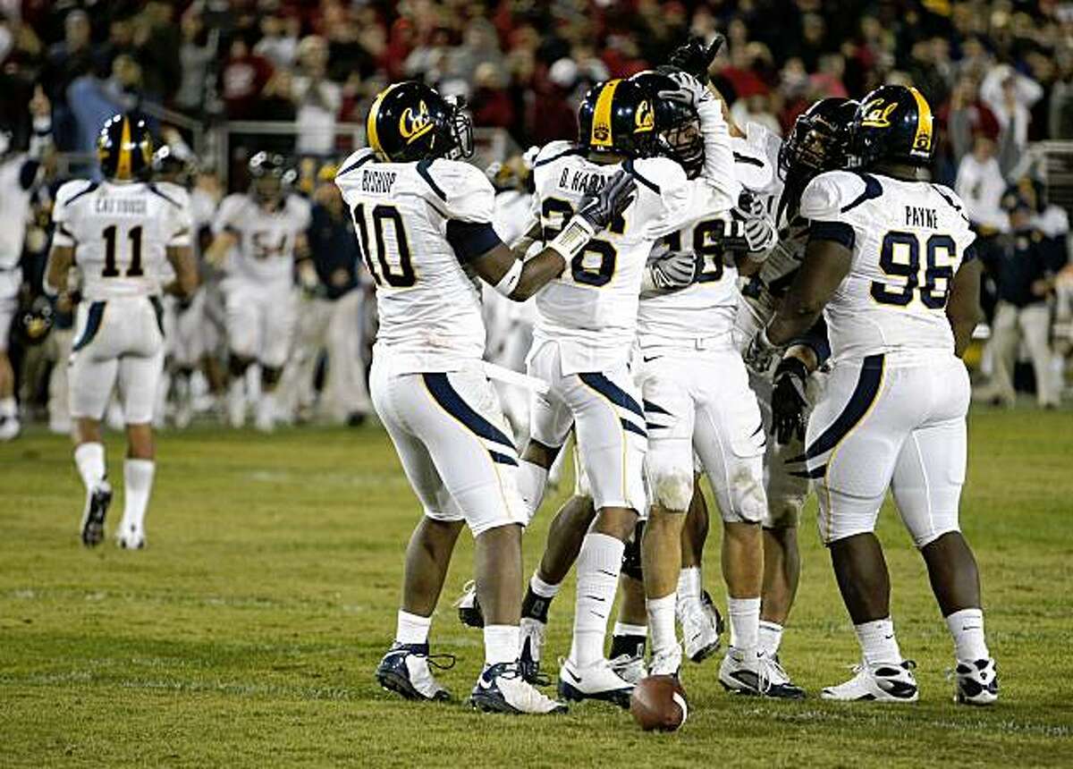 California celebrates the interception by California's Michael Mohamed (18) in Big Game action as the Stanford Cardinal falls to the California Golden Bears 34-28 in Palo Alto, Calif. on Saturday November 21, 2009.