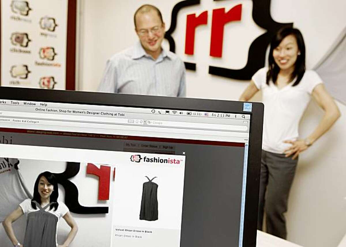Carol Chow and David Selinger are demonstrating a new online shopping technology that leverages augmented reality and motion capture to allow consumers to virtually try on clothes. Selinger (left) is CEO and founder of the Rich Relevance company. Si Friday, November 13, 2009. San Francisco Calif.