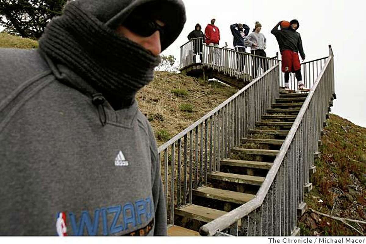 Physical trainer Frank Matrisciano works with his group of players at Golden Gate Heights Park in San Francsico, Calif., using the 116 wooden steps as a training ground, on May 30, 2008.Photo By Michael Macor/ The Chronicle