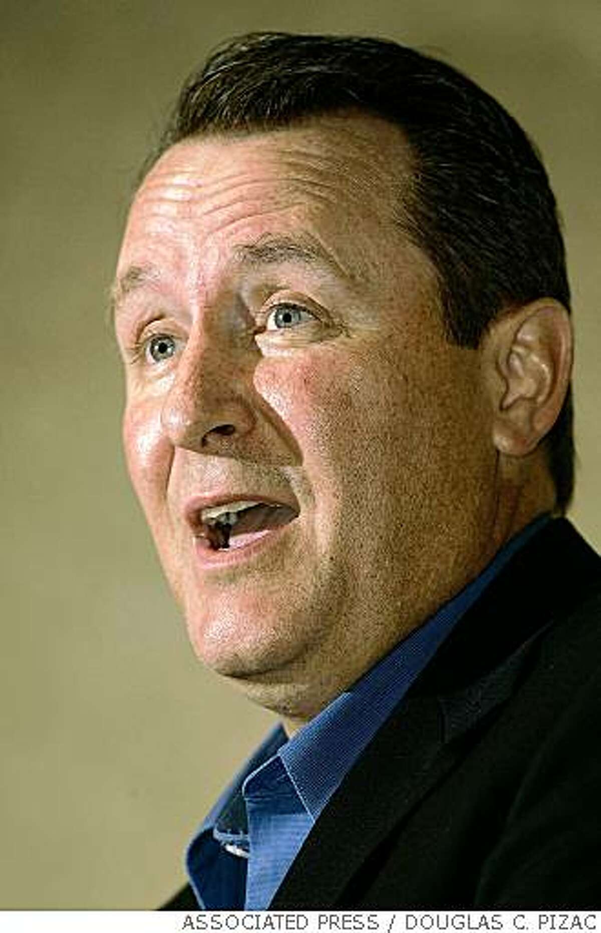 Utah's Attorey General Mark Shurtleff speaks at the annual Utah Public Health conference, Monday, May 9, 2005, in Park City, Utah. Shurtleff addressed the issue of polygamy in the state and what can be done to help those communities. (AP Photo/Douglas C. Pizac)
