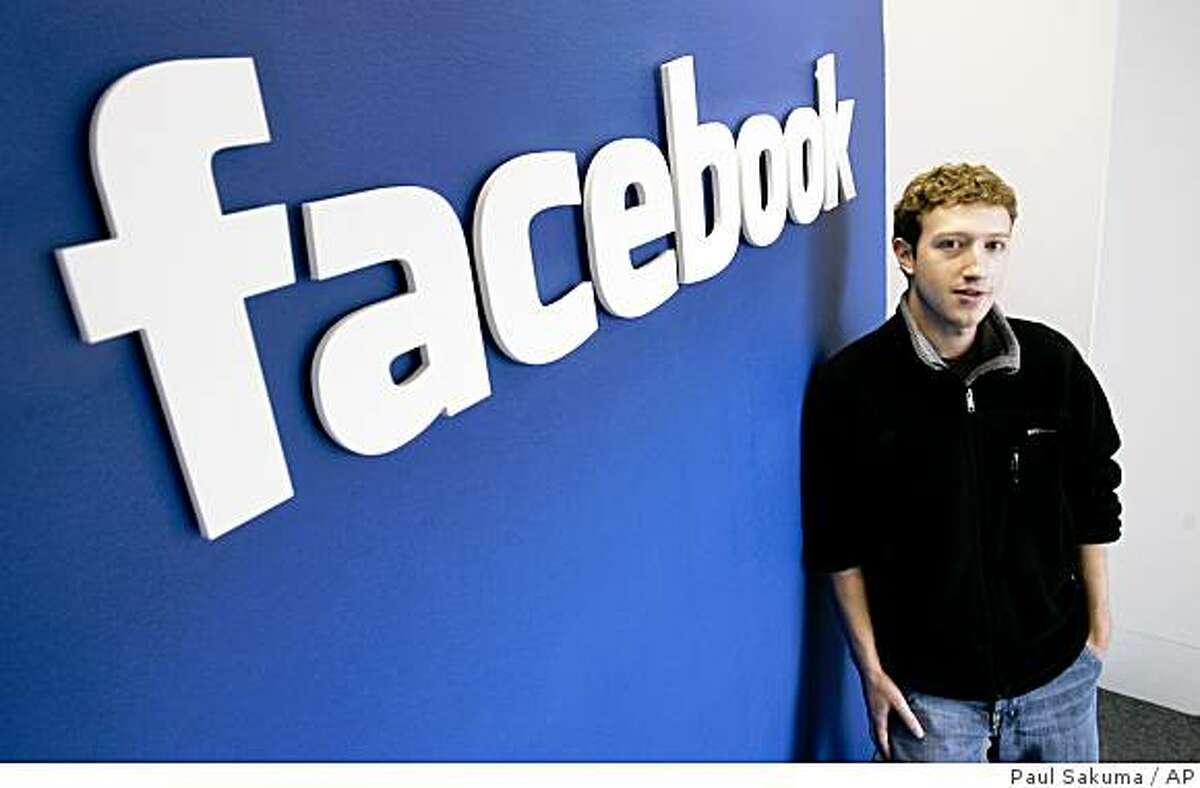 Facebook founder and CEO Mark Zuckerberg poses at Facebook headquarters in Palo Alto, Calif., Feb. 5, 2007. In an about-face following a torrent of online protests, Facebook is backing off a change in its user policies while it figures how best to resolve questions like who controls the information shared on the social networking site. (AP Photo/Paul Sakuma)