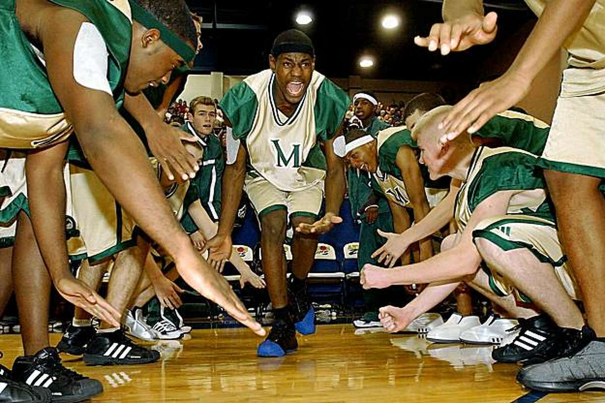 LeBron James (center) with St. Vincent-St. Mary's basketball team, as seen in MORE THAN A GAME.