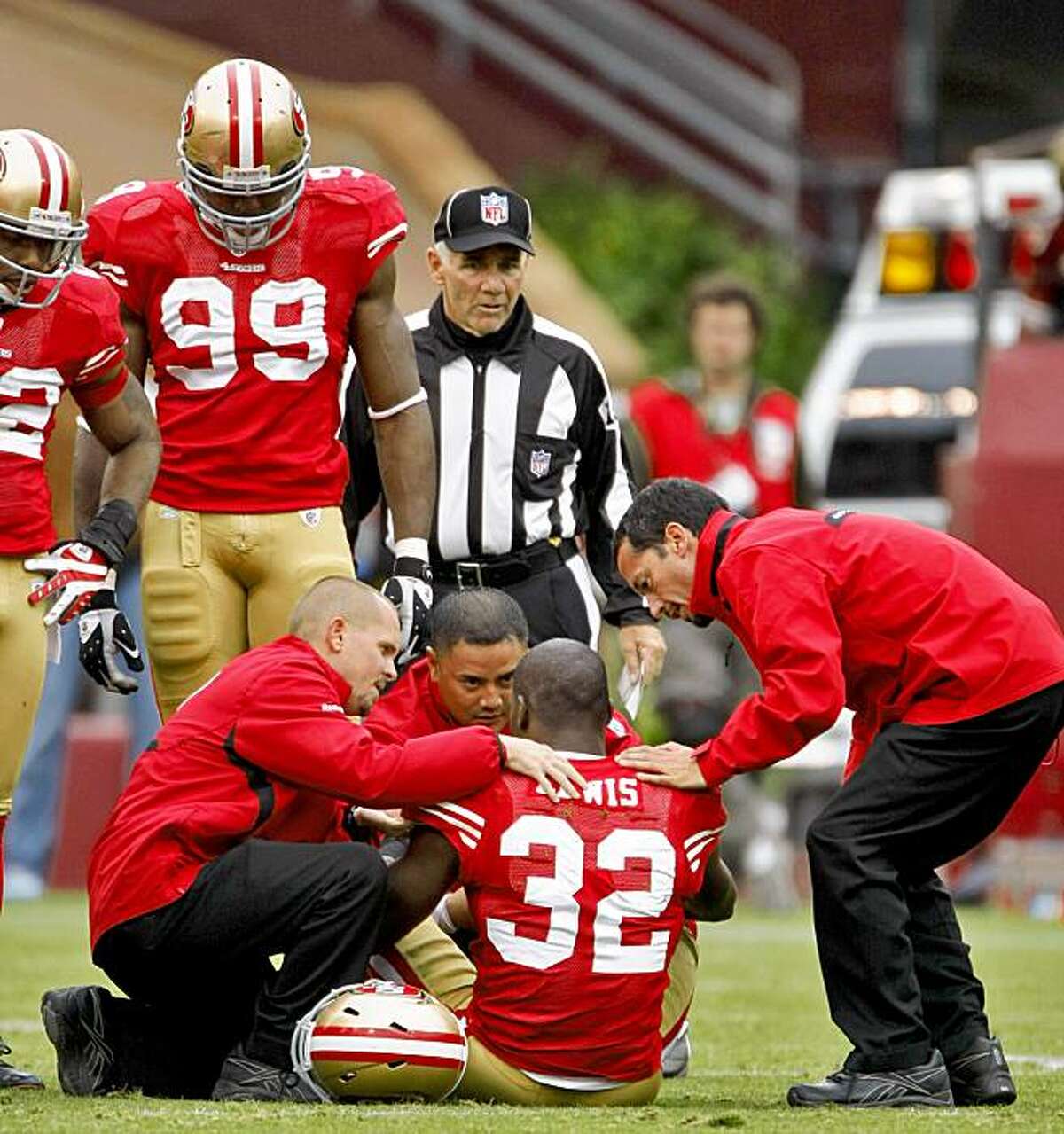 Michael Lewis is injured in the first half of the 49ers' game against the Atlanta Falcons on Sunday at Candlestick in San Francisco.
