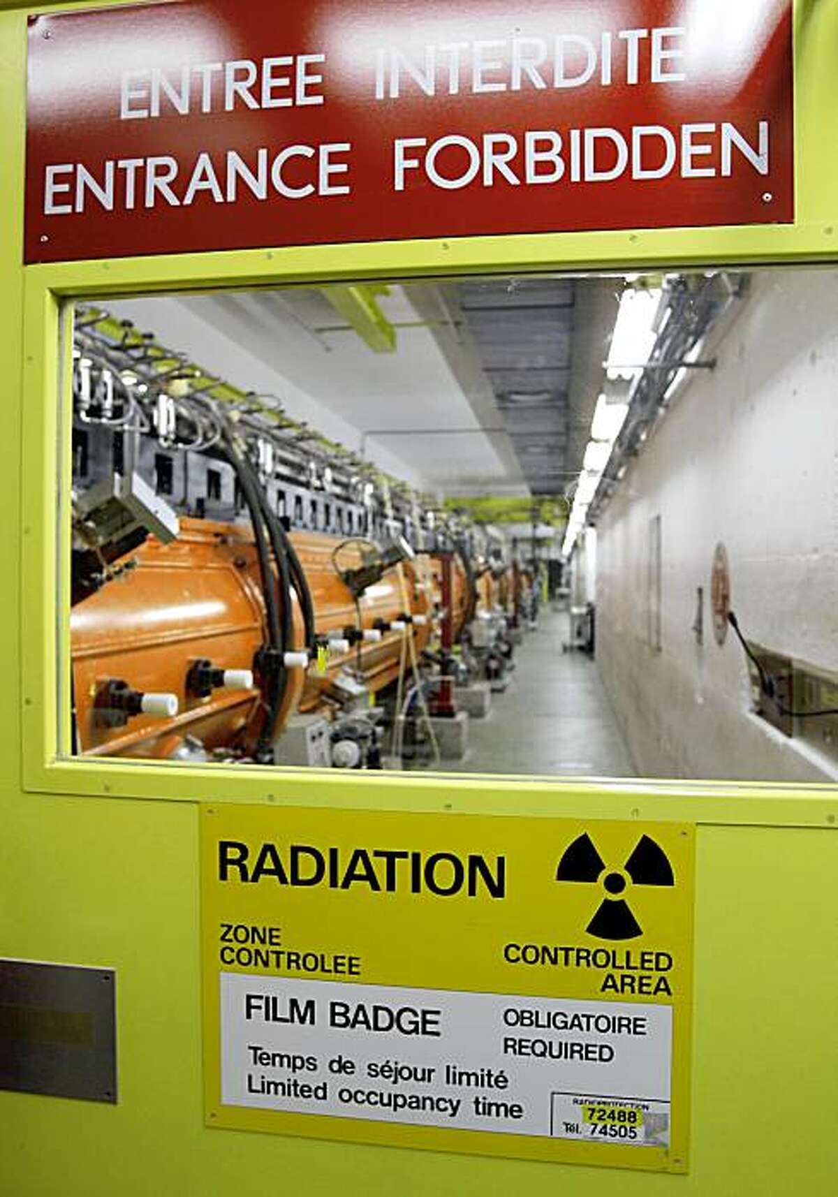 FILE - In this Oct. 16, 2008 file picture the inside view of a facility in the CERN laboratories is pictured near Geneva, Switzerland. French police have arrested a nuclear physicist on suspicion that he had links to terrorist organizations in Algeria, the European Organization for Nuclear Research said Friday Oct. 9, 2009. The man was one of more than 7,000 scientists working at the organization and has been assigned to analysis projects under contract with an outside institute, said the organization, known as CERN. (AP Photo/Keystone, Martial Trezzini,File). (AP Photo/Keystone/Keystone,Martial Trezzini,File)