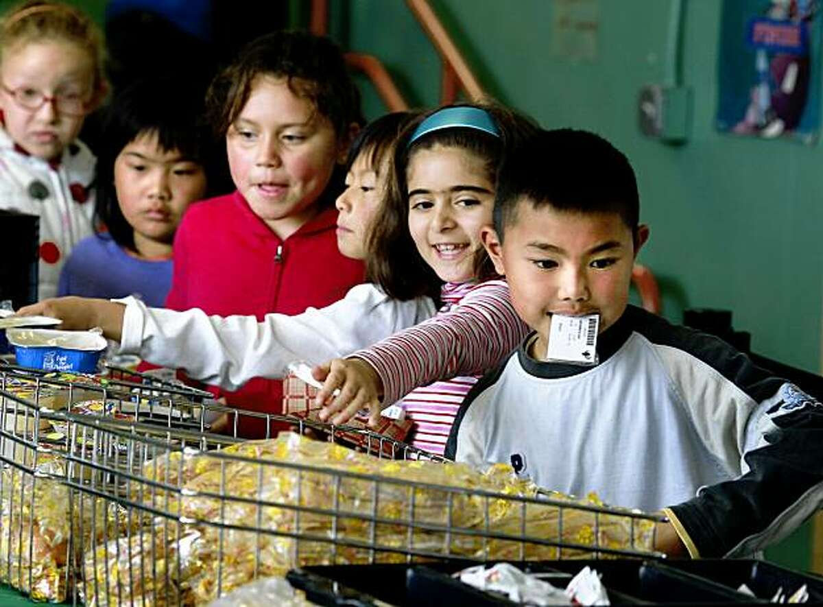 Leo King (right) and other students made their meal choices. Around 500 students at the Francis Scott Key Elementary School in San Francisco's Sunset district are served by the school lunch program and officials are proud of their efforts keeping the children fed every school day. The San Francisco School district has had problems managing the school lunch program and has recently lost some federal funding.
