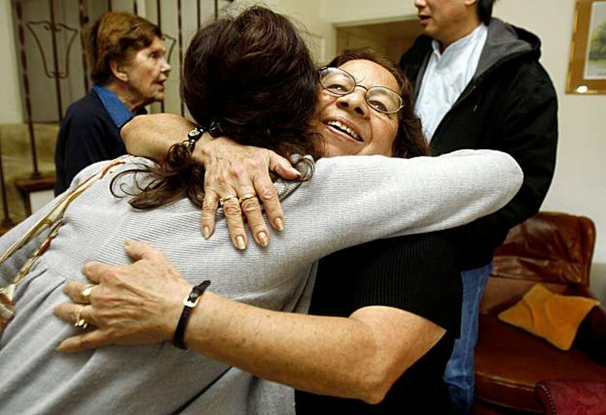 Vilma Serralta, housekeeper and nanny, hugs her lawyer Hillary Ronen in Burlingame, Calif., on Monday, October 12, 2009. Serralta reached a cash settlement with an Atherton couple on her claims that they failed to pay her the minimum wage or overtime while working her 14 hours a day and six days a week for four years.