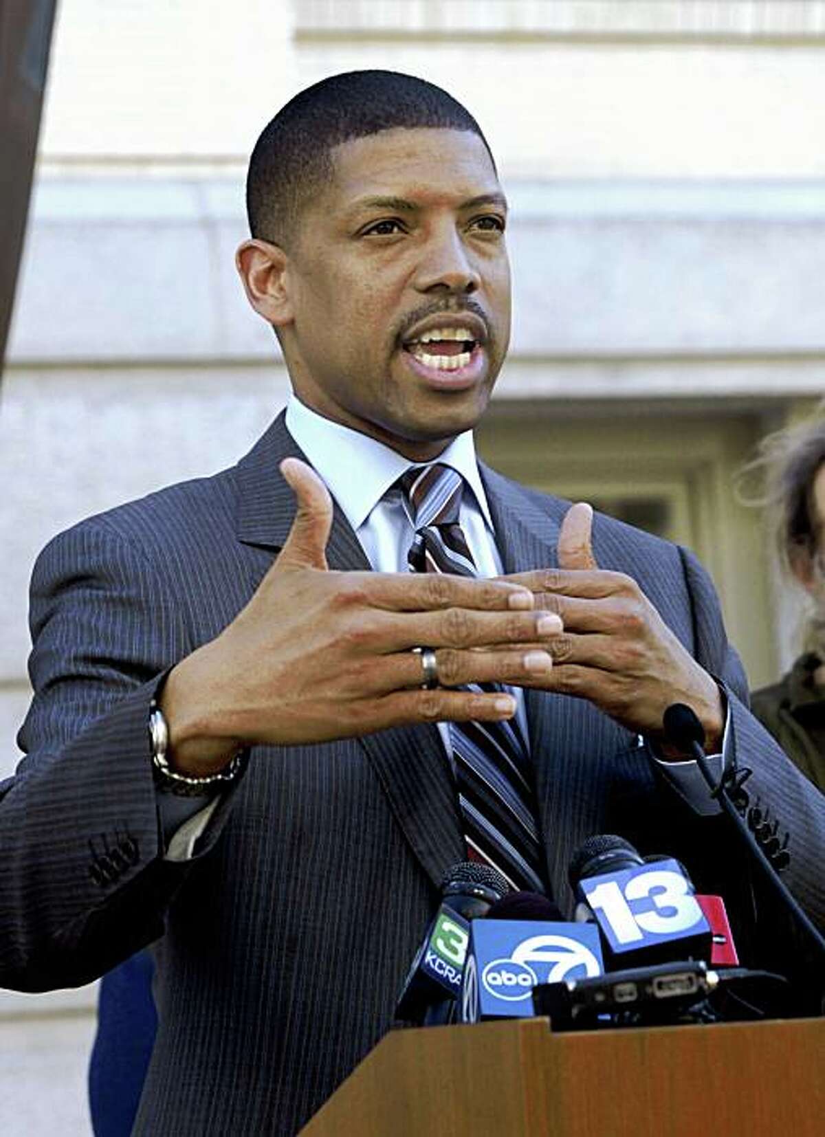 Sacramento Mayor Kevin Johnson announced that city officials have devised a temporary plan to offer shelter space and transitional housing to the estimated 150 homeless living in what has become known as "Tent City," during a news conference in Sacramento, Calif., Thursday, March 19, 2009. Johnson said he will take the proposal to the Sacramento City Council for approval on Tuesday.(AP Photo/Rich Pedroncelli)
