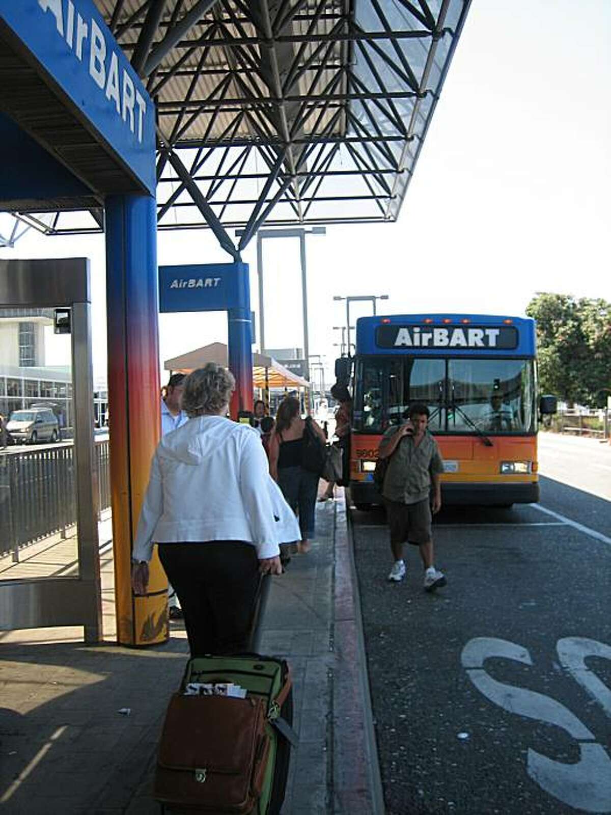 AirBart stops have been relocated, but the small signs do little to alert passengers waiting at old AirBart platforms.