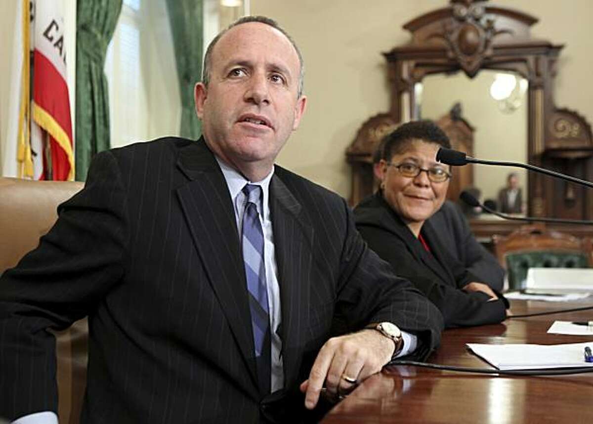 State Senate President Pro Tem Darrell Steinberg, D-Sacramento, left, responds to a question during a news conference held with Assembly Speaker Karen Bass, D-Los Angeles, to discuss the results of Tuesday's special election at the Capitol in Sacramento, Calif., Wednesday, May 20, 2009. The voters rejection of the five-budget-related propositions leaves lawmakers and Gov. Arnold Schwarzenegger searching for ways to fill a projected $21.3 billion budget deficit for the new fiscal year that begins July 1.(AP Photo/Rich Pedroncelli)