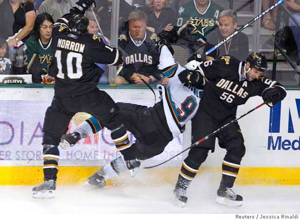 ###Live Caption:Dallas Stars' Brendan Morrow (L) and Sergei Zubov (R) collide with San Jose Sharks' Milan Michalek late in the third period in Game 6 of their NHL Western Conference semi-final hockey game in Dallas, Texas, May 4, 2008. REUTERS/Jessica Rinaldi (UNITED STATES)###Caption History:Dallas Stars' Brendan Morrow (L) and Sergei Zubov (R) collide with San Jose Sharks' Milan Michalek late in the third period in Game 6 of their NHL Western Conference semi-final hockey game in Dallas, Texas, May 4, 2008. REUTERS/Jessica Rinaldi (UNITED STATES)###Notes:Dallas Stars' Brendan Morrow and Sergei Zubov collide with San Jose Sharks' Milan Michalek late in the third period in Game 6 of their NHL Western Conference semi-final in Dallas###Special Instructions:0