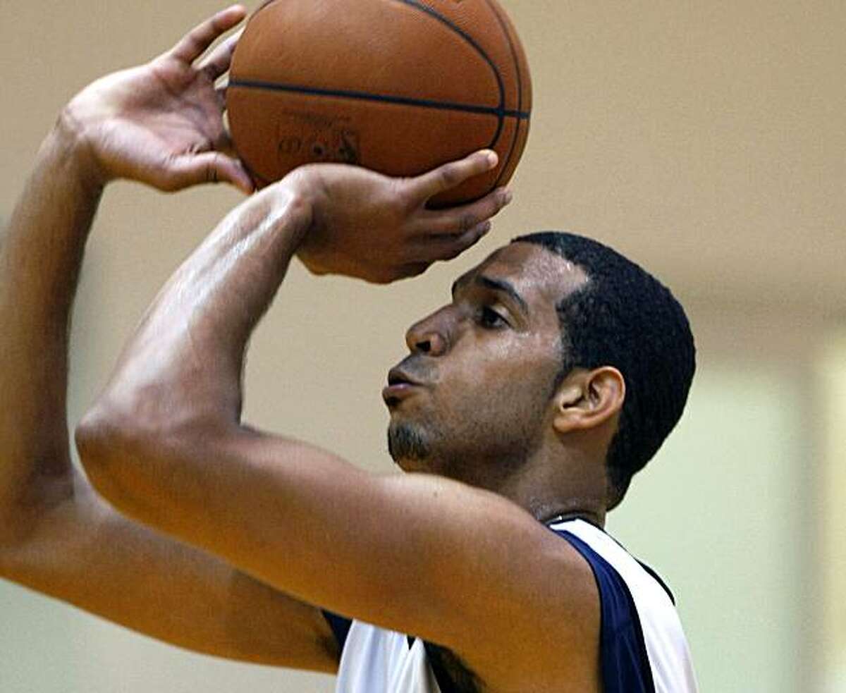 Brandan Wright sets for a shot during a Warriors first training camp in Oakland Ca. Sept 29, 2009