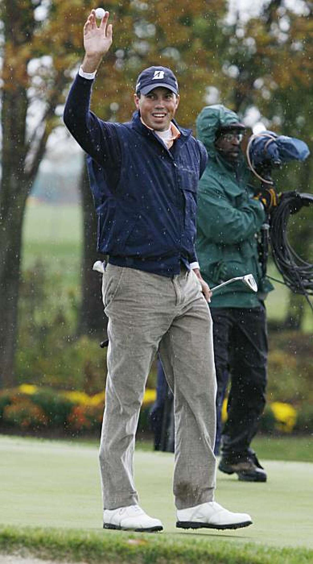 Matt Kuchar, of Atlanta, Ga., reacts after making the putt on the 13th hole during a sudden death round of the PGA golf Turning Stone Resort Championship in Verona, N.Y., Monday, Oct. 5, 2009. Kuchar won the tournament on the sixth hole of a sudden-death playoff against Vaughn Taylor.