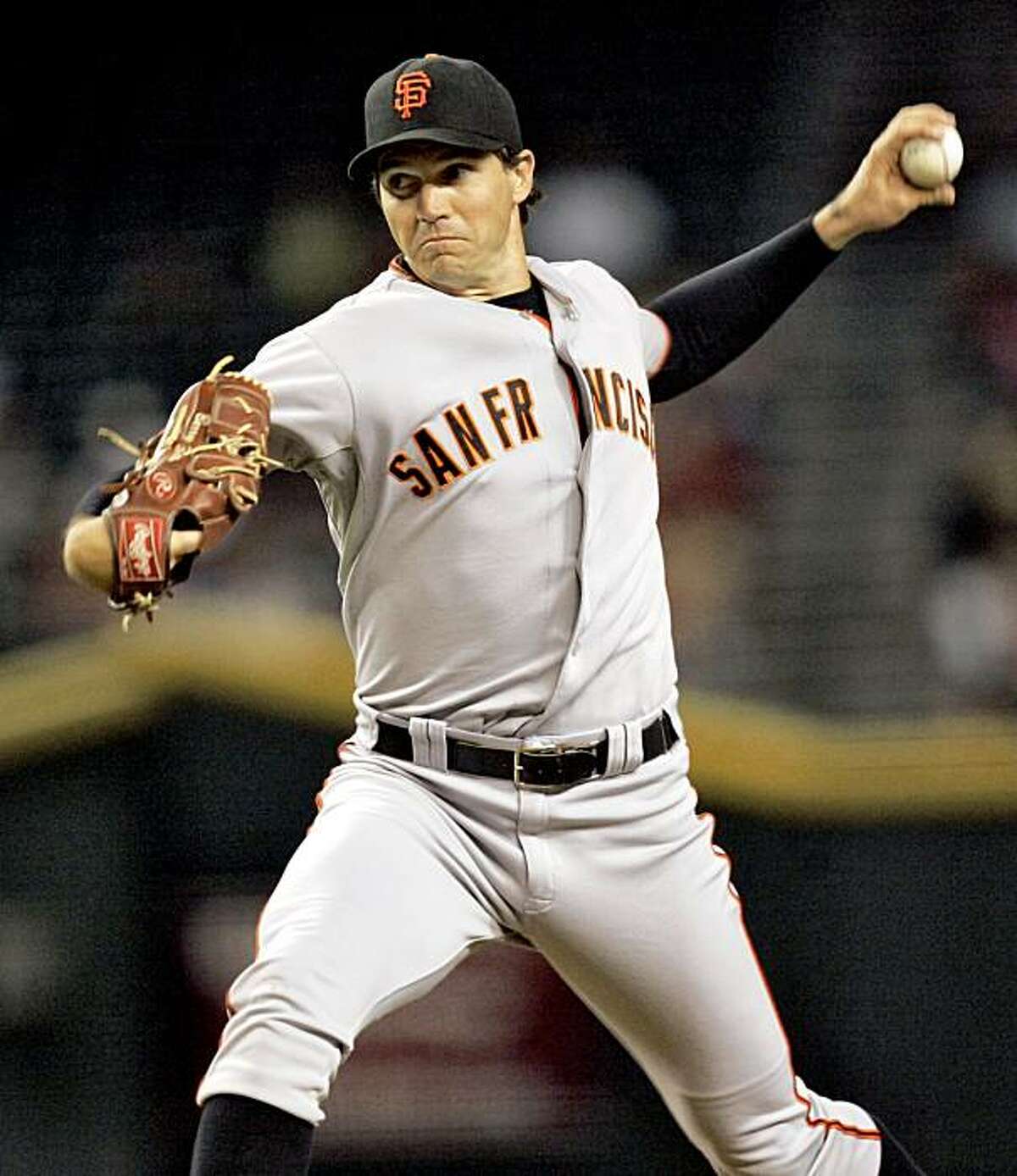 San Francisco Giants pitcher Barry Zito delivers against the Arizona Diamondbacks during the first inning of a baseball game Monday, Sept. 21, 2009, in Phoenix.
