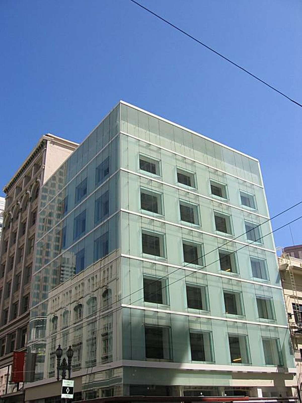 A nondescript commercial building from the 1950s at 185 Post St. has received a stylish renovation that includes a glass skin outside the original brick walls. The design by Brand Allen Architects received a 2008 Honor Award for Architecture from the San Francisco chapter of the American Institute of Architects