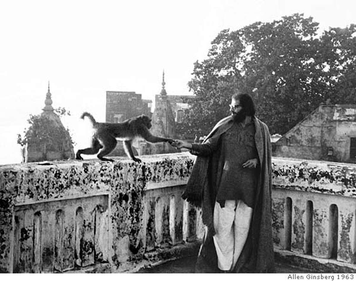 ###Live Caption:ca. 1963, Varanasi, India --- Allen Ginsberg plays with a visiting monkey on the rooftop of a rented room in India. --- From "A Blue Hand"Image by © Allen Ginsberg/CORBIS / FOR USE WITH BOOK REVIEW ONLY###Caption History:ca. 1963, Varanasi, India --- Allen Ginsberg plays with a visiting monkey on the rooftop of a rented room in India. --- From "A Blue Hand"Image by � Allen Ginsberg/CORBIS / FOR USE WITH BOOK REVIEW ONLY###Notes:###Special Instructions: