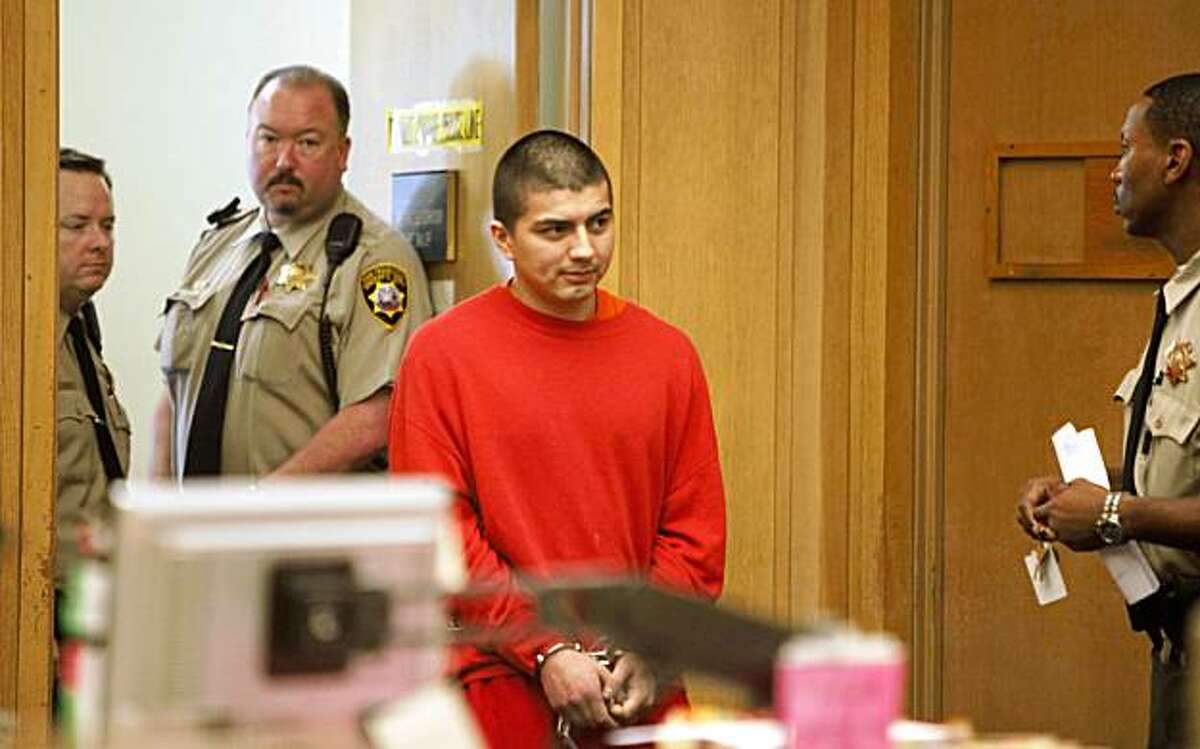 Edwin Ramos, charged with the shooting deaths of a father and his two sons last year, shows in court at the San Francisco Hall of Justice where is was announced that the DA, Kamala Harris, will seek a penalty of life in prison without parole on Thursday Sep. 10, 2009 in San Franicisco, Calif. Harris has always said she wouldn't seek capital punishment.