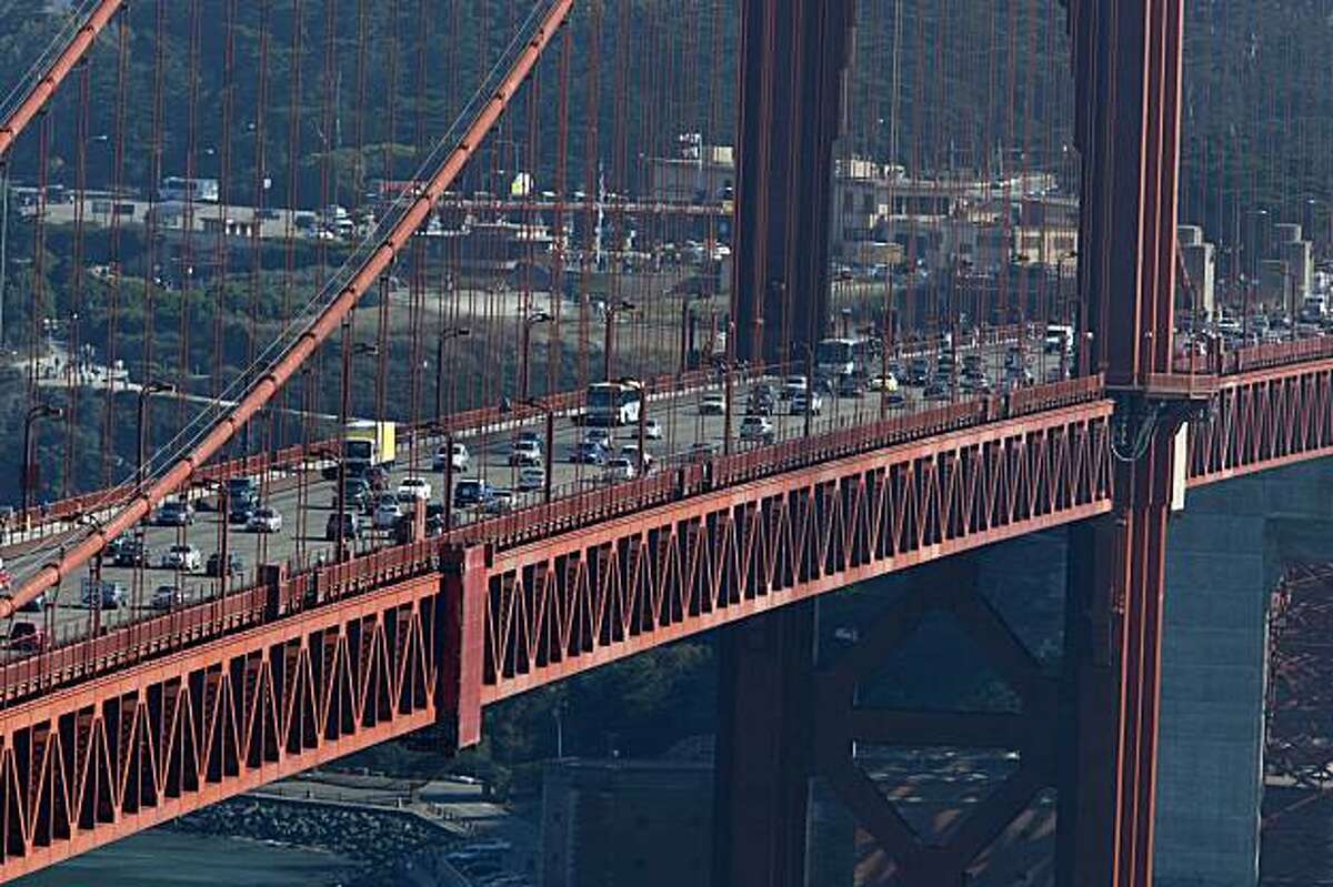 Traffic moves over the Golden Gate Bridge on Friday.