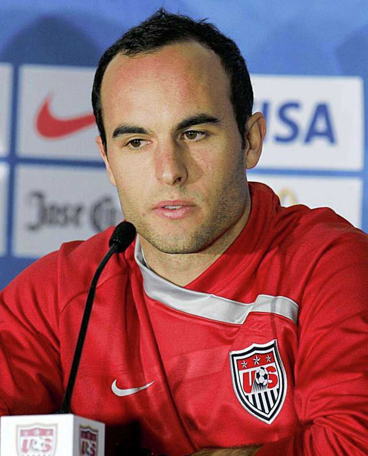 -- FILE -- In this Feb. 10, 2009, file photo, U.S. national soccer team member Landon Donovan answers questions during a news conference at Crew Stadium in Columbus, Ohio. Donovan has tested positive for swine flu, although the team is optimistic he can play Saturday night, Aug. 15, 2009. (AP Photo/Paul Vernon,file)