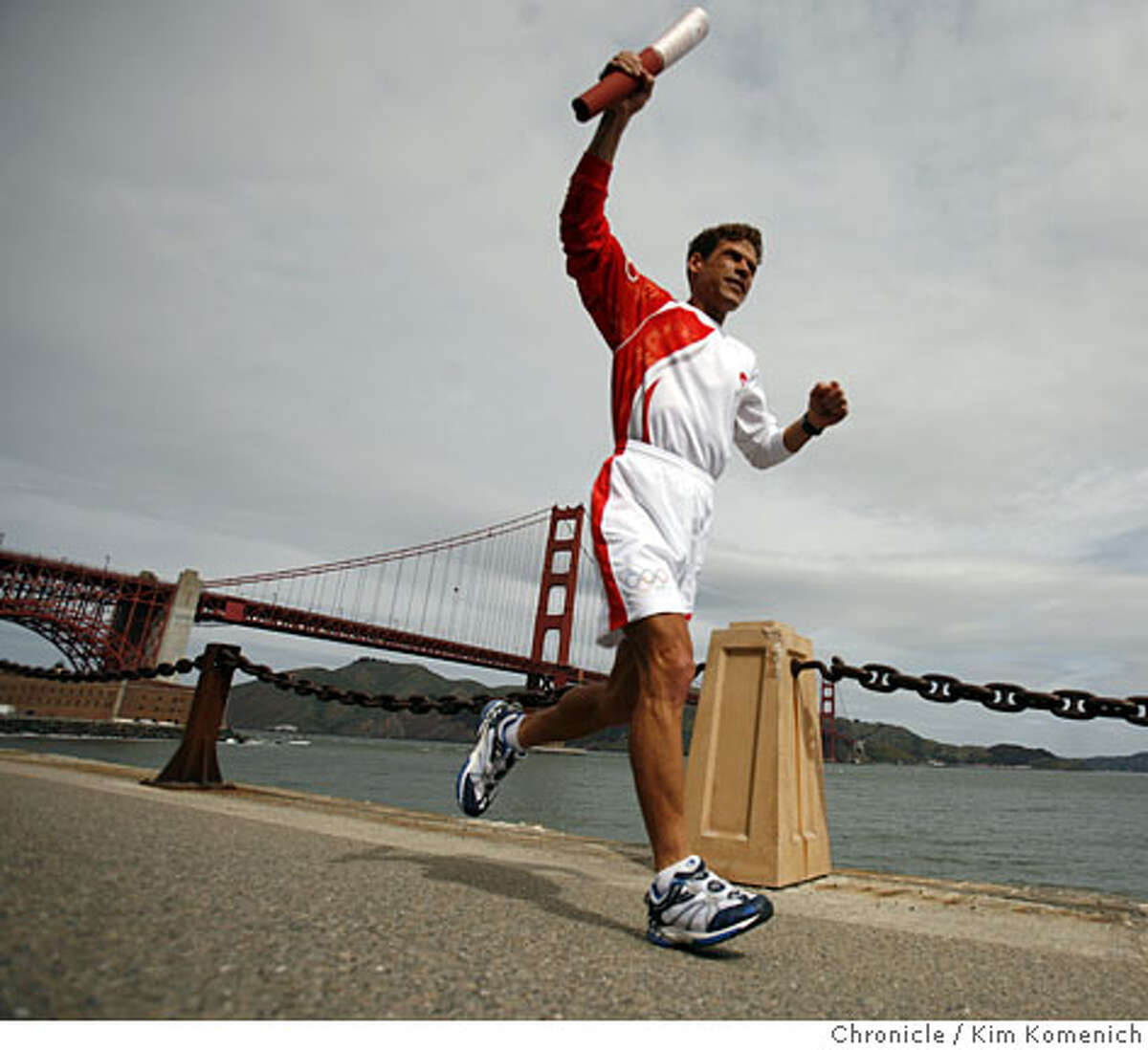 Olympic torchbearer Dean Karnazes, 44, of San Francisco participates in a photo-op for the San Francisco leg of the Olypic torch run near Fort Point in San Francisco, Calif., on April 8, 2008 Photo by Kim Komenich / San Francisco Chronicle