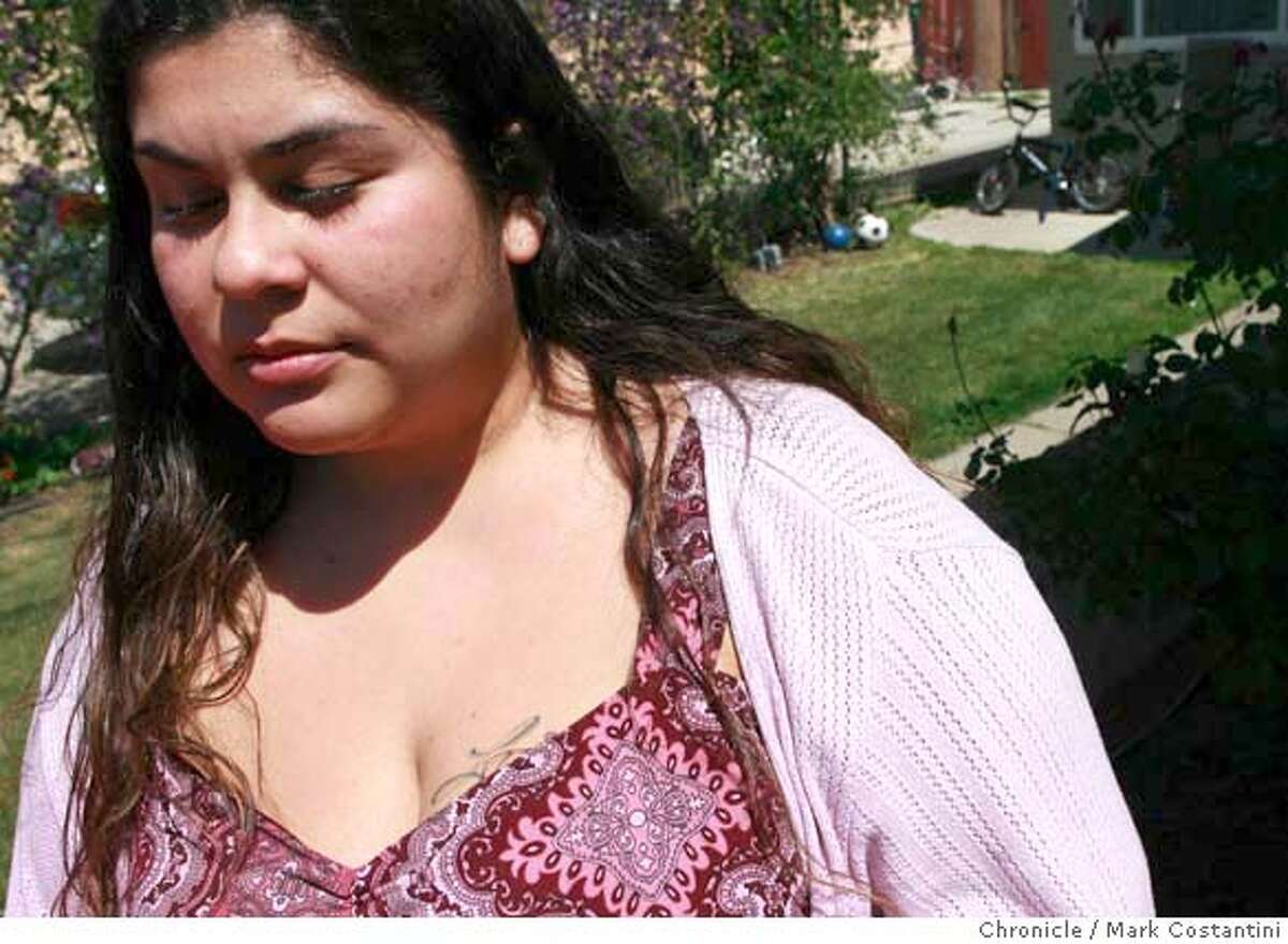 Lilia Guzman-Solari, wife of shooting victim Luis Solari in front of her home on April 10, 2008 in Richmond, Calif. Photo by Mark Costantini / San Francisco Chronicle.