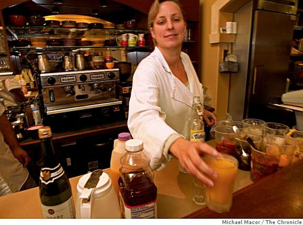 Jennifer Paillet is the owner of "Zazie" restaurant in the Cole Valley district of San Francisco, Calif. Paillet provides the required health care to her employees by adding a surcharge of $1 per customer onto each bill. Paillet working the counter making drinks for the lunch crowd, on Wednesday Jan. 14, 2009.