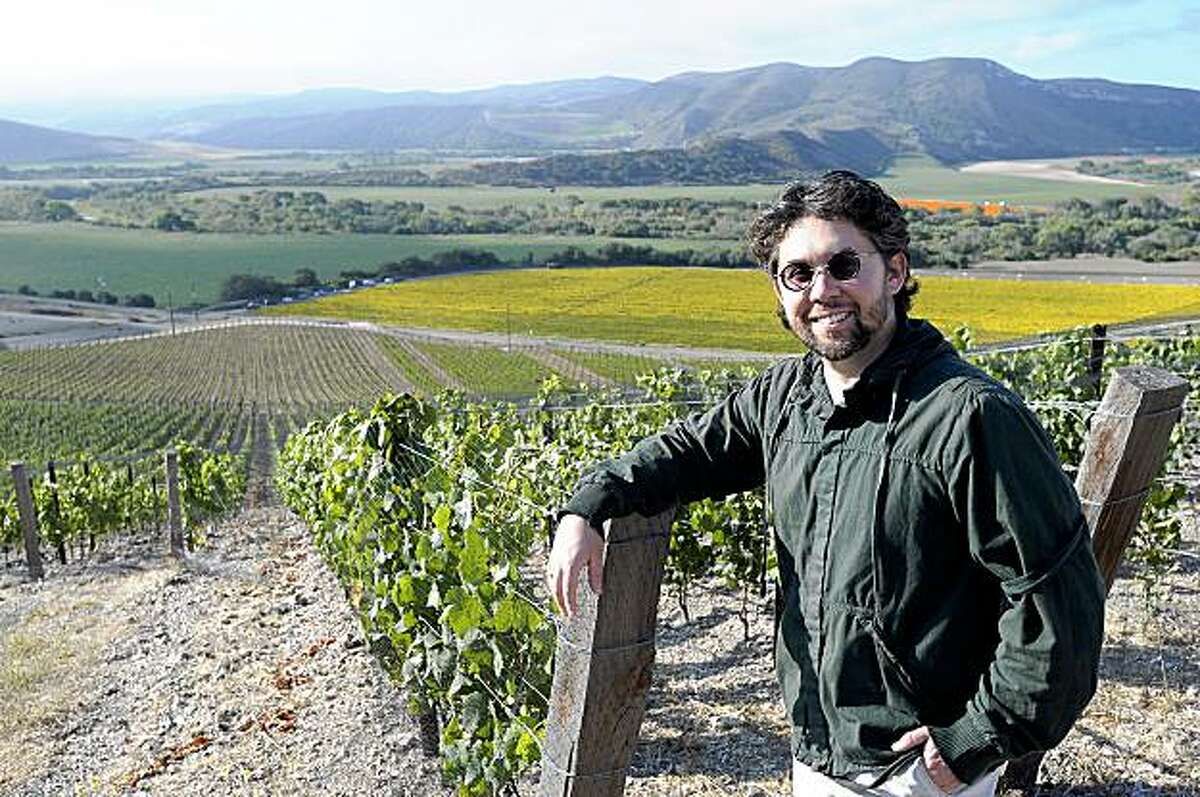 Winemaker Sashi Moorman of Stolpman wineries poses for a photo next to his vineyards in Lompoc, California on Friday, August 7, 2009. Photo/Phil Klein