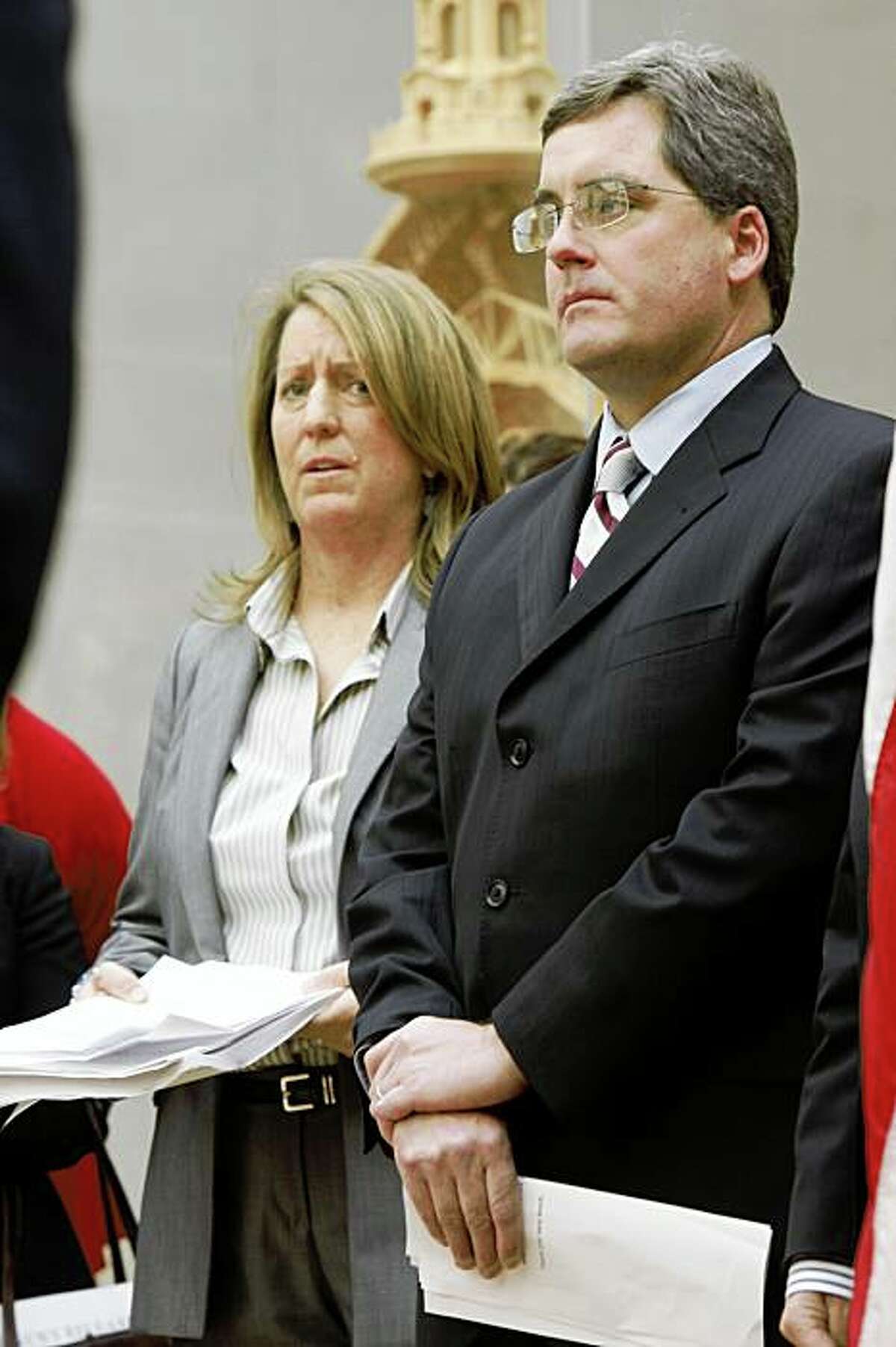 Kate Kendall from the National Center for Lesbian Rights and SF city attorney Dennis Herrera hear comments on the California Supreme Court Prop 8 decision at city hall in San Francisco, Calif., on Monday, May 26, 2009.