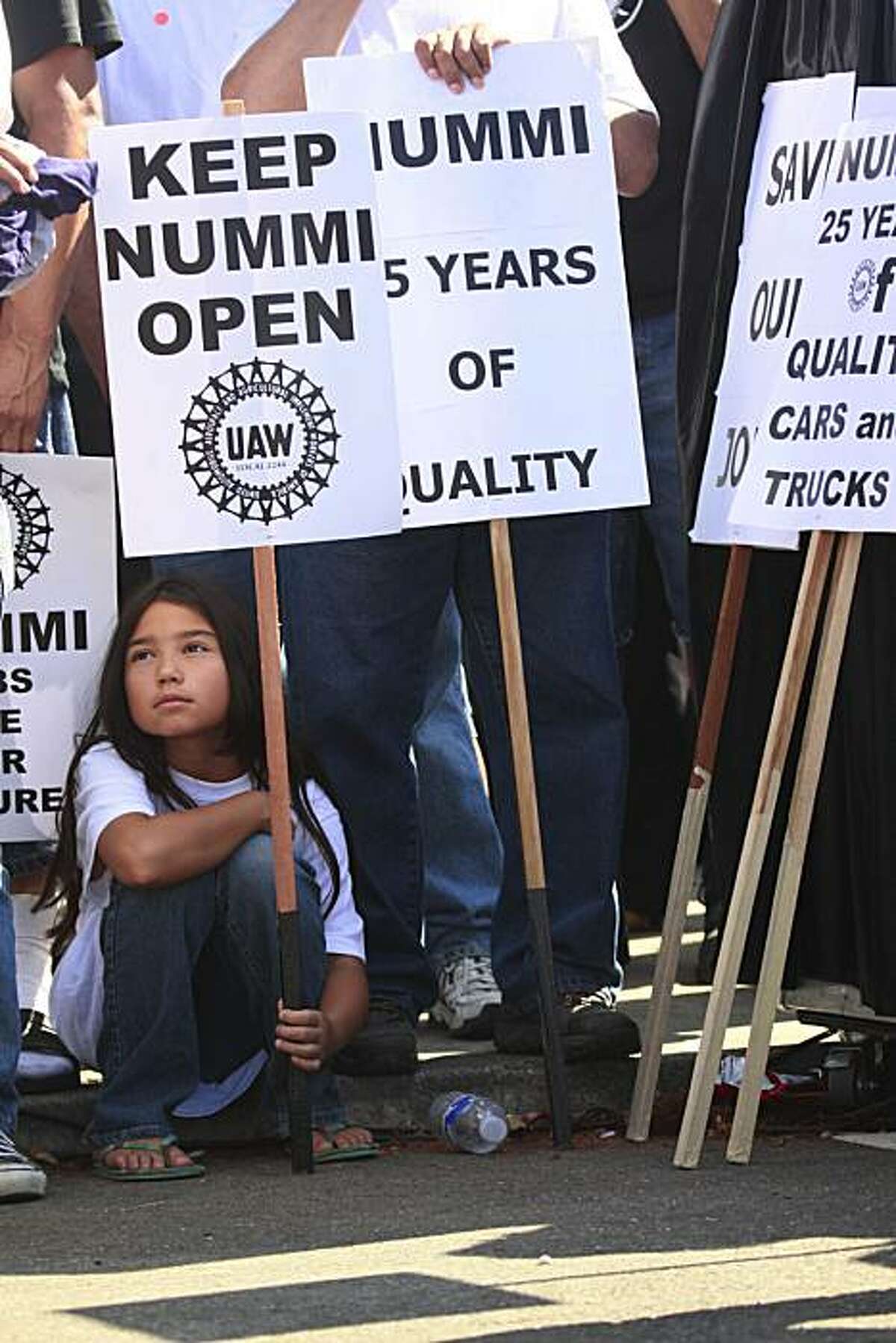 Linda Corona, 10 of Fremont, attended the Nummi rally with her father, Gerard Corona (not shown) to support workers in Fremont, Calif. on Thursday, August 20, 2009.