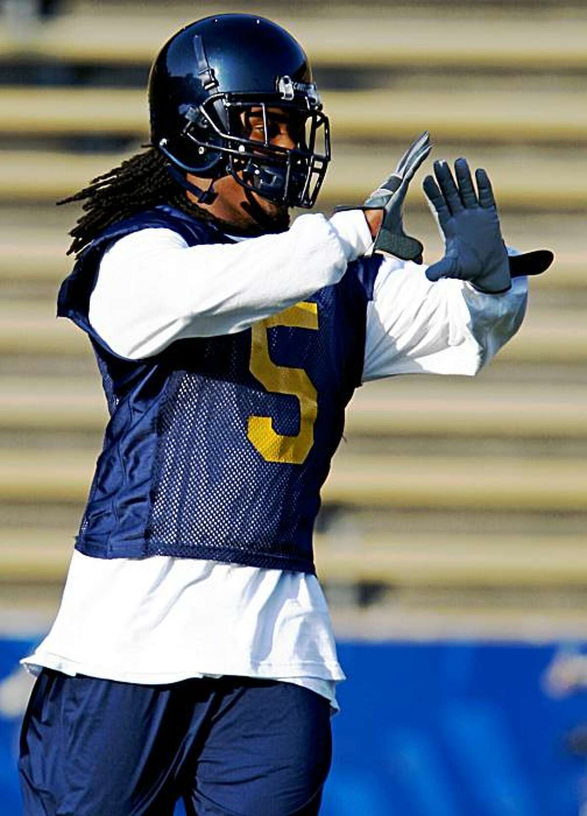 Cal Defensive Back Syd'Quan Thompson runs drills during workouts at the Bears fall practice at Berkeley's Memorial Stadium Aug 7, 2009.