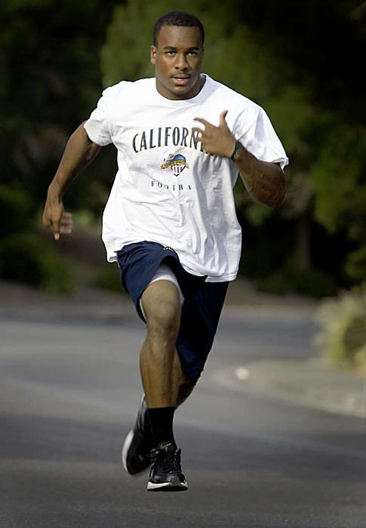 Jahvid Best sprints up a steep section of Georgia Street in Vallejo, Calif., on Wednesday, Aug. 5, 2009. The star running back for the California Golden Bears stays in shape during the off-season by running up the hill several times, two or three days a week.