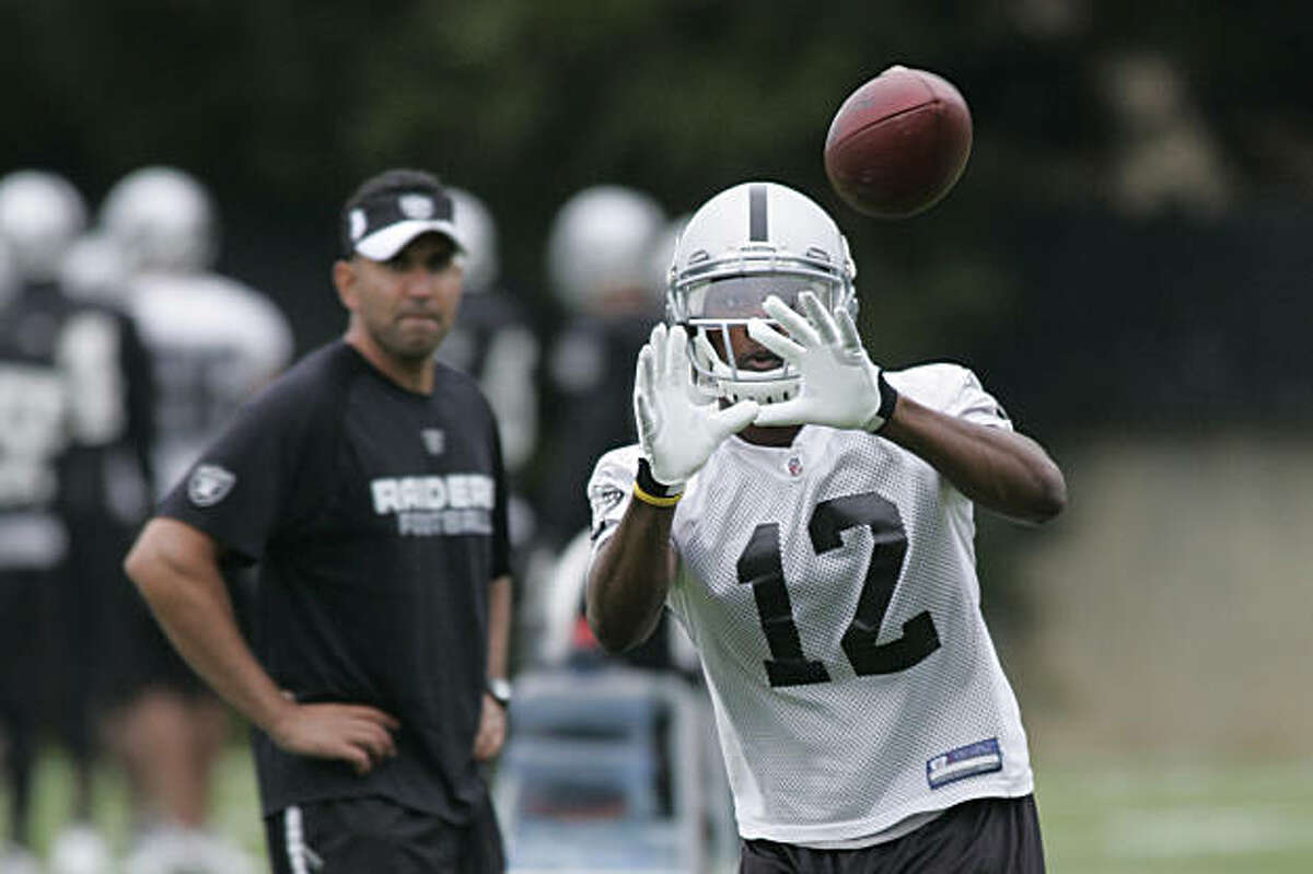 Under the watchful eyes of coaching staff, the Raider's newest recruit, #12 Darrius Heyward-Bey (WR) does pass catching drills at the Oakland Raiders training camp in Napa, Calif. on Friday, July 31, 2009. Photo by Kat Wade / Special to the Chronicle