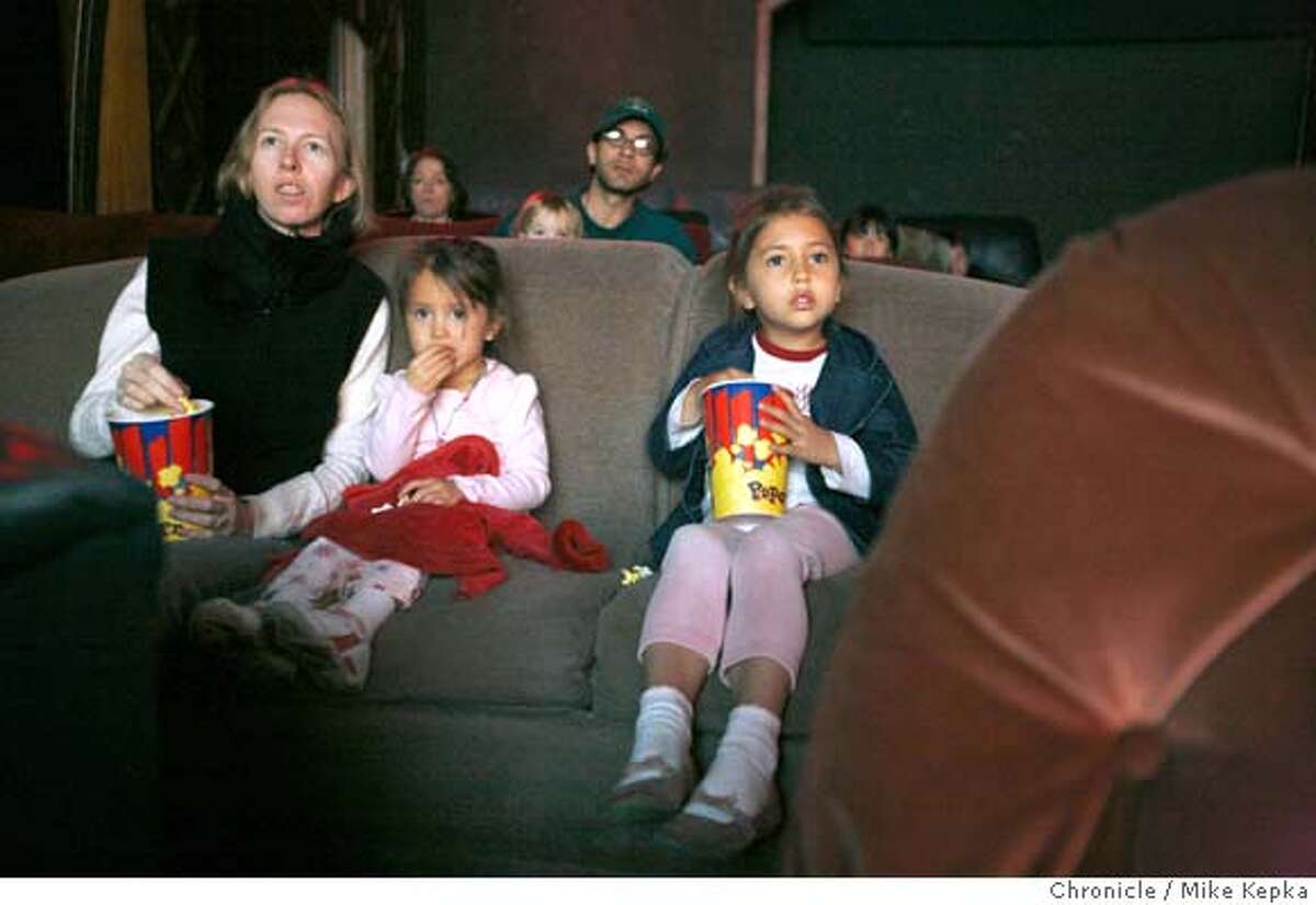 Gidget Valadez and her daughters Hali Valadez, 3, and Rachel Valadez, 5, watch a late morning screening of Horton Hears a Who at The Alameda Central Cinema on Thursday, March 27, 2008 in Alameda, Calif. Theater owner, Mark Haskett turned the former funeral home into a theater in 2004 and now exclusively runs movies geared towards families. Photo by Mike Kepka / San Francisco Chronicle
