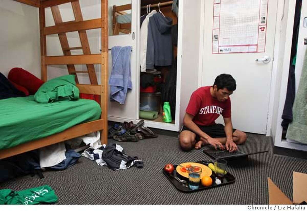 ###Live Caption:Jason Scott having lunch and doing homework in his dorm room on the Stanford University campus in Palo Alto, Calif., on Wednesday, March 5, 2008. He is on a federal Pell Grant for low-income students. Photo by Liz Hafalia / San Francisco Chronicle###Caption History:Jason Scott having lunch and doing homework in his dorm room on the Stanford University campus in Palo Alto, Calif., on Wednesday, March 5, 2008. He is on a federal Pell Grant for low-income students. Photo by Liz Hafalia / San Francisco Chronicle###Notes:Jason Scott having lunch and doing homework in his dorm room on the Stanford University campus in Palo Alto, Calif., on Wednesday, March 5, 2008. He is on a federal Pell Grant for low-income students. Liz Hafalia / The Chronicle / {city } / 3/5/08 **Ja###Special Instructions:�2008, San Francisco Chronicle/ Liz Hafalia MANDATORY CREDIT FOR PHOTOG AND SAN FRANCISCO CHRONICLE. NO SALES- MAGS OUT.