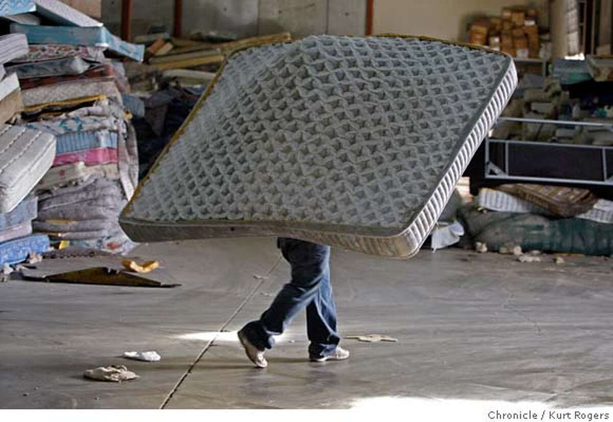 ###Live Caption:This mattress is being taken out to a land fill it is one of the few that cant be recycled by DR3 a San Leandro nonprofit company that recycles old mattresses to keep them out of land fill. Wednesday March 12 2008 Photo By Kurt Rogers / San Francisco Chronicle###Caption History:This mattress is being taken out to a land fill it is one of the few that cant be recycled by DR3 a San Leandro nonprofit company that recycles old mattresses to keep them out of land fill. Wednesday March 12 2008 Photo By Kurt Rogers / San Francisco Chronicle###Notes:Mattress Recycling###Special Instructions:MANDATORY CREDIT FOR PHOTOG AND SAN FRANCISCO CHRONICLE/NO SALES-MAGS OUT