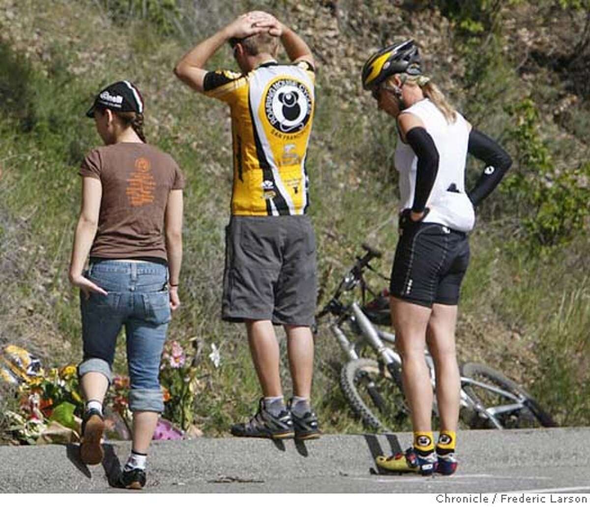###Live Caption:Members of the Roaring Mouse Cycling Clug of San Francisco stand by a make shift memorial has was placed at the scene Martch 10, 2008, of where Deputy James Council who was working patrol Sunday morning crossed onto the wrong side of Stevens Canyon Road at 10:25 a.m. and rammed the three southbound bicyclists head-on killing two and injuring the other. 3/10/08 Photo by Frederic Larson / San Francisco Chronicle###Caption History:Members of the Roaring Mouse Cycling Clug of San Francisco stand by a make shift memorial has was placed at the scene Martch 10, 2008, of where Deputy James Council who was working patrol Sunday morning crossed onto the wrong side of Stevens Canyon Road at 10:25 a.m. and rammed the three southbound bicyclists head-on killing two and injuring the other. 3/10/08 Photo by Frederic Larson / San Francisco Chronicle###Notes:###Special Instructions:MANDATORY CREDIT FOR PHOTOG AND SAN FRANCISCO CHRONICLE/NO SALES-MAGS OUT