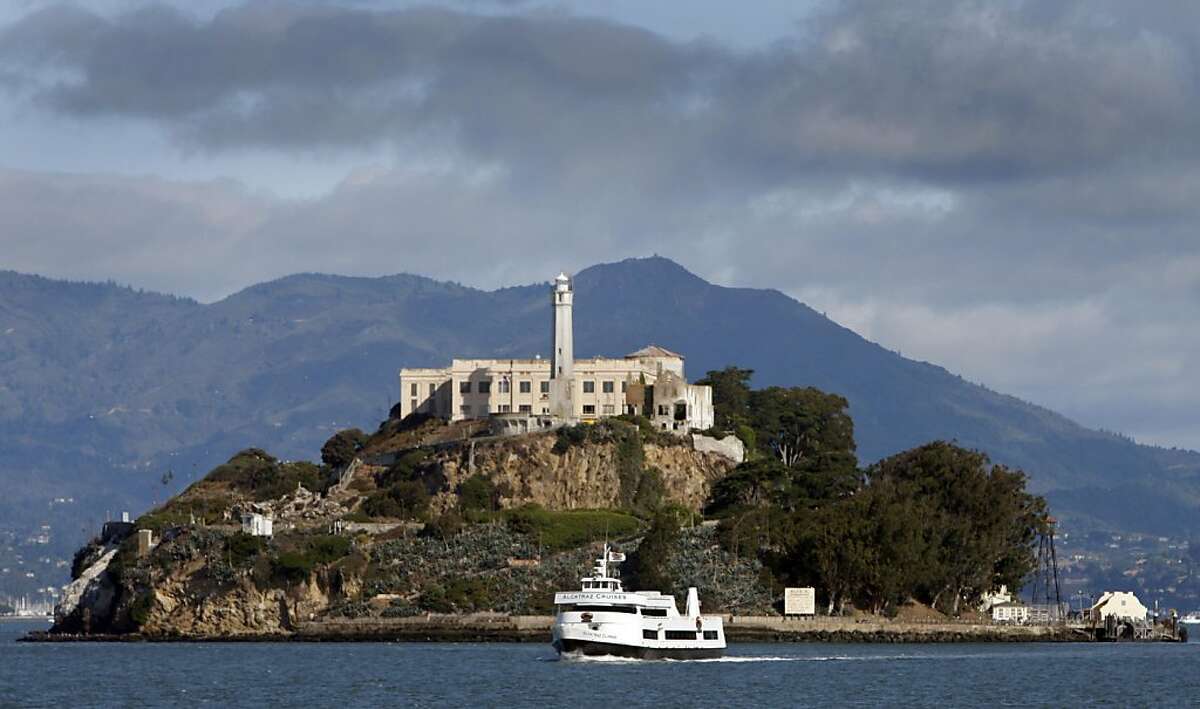 A ferry boat leaves Alcatraz Island in San Francisco, Calif., on Thursday, Aug. 6, 2009. Alcatraz will celebrate the 75th anniversary of its history as a federal prison this weekend.