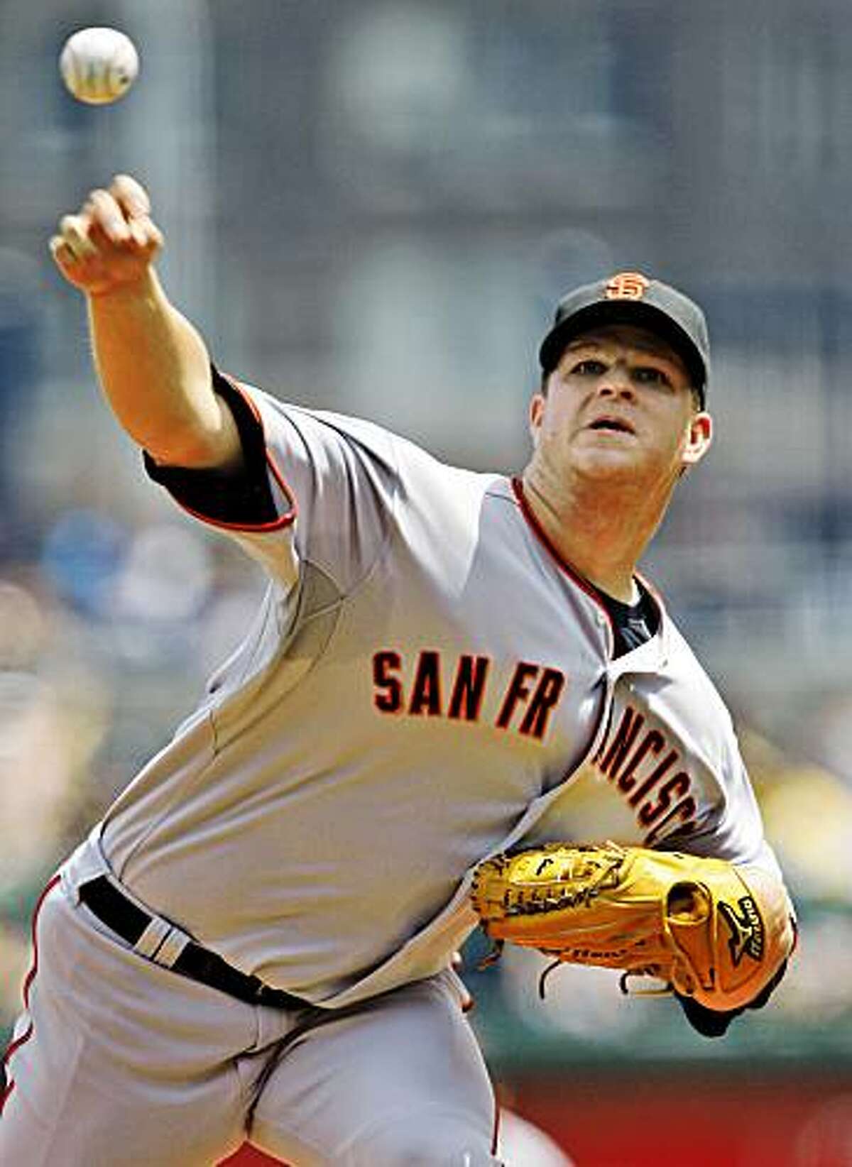 San Francisco Giants pitcher Matt Cain throws in the third inning against the Pittsburgh Pirates during a baseball game in Pittsburgh on Sunday, July 19, 2009. Cain got his 11th win of the season in the Giants' 4-3 win.