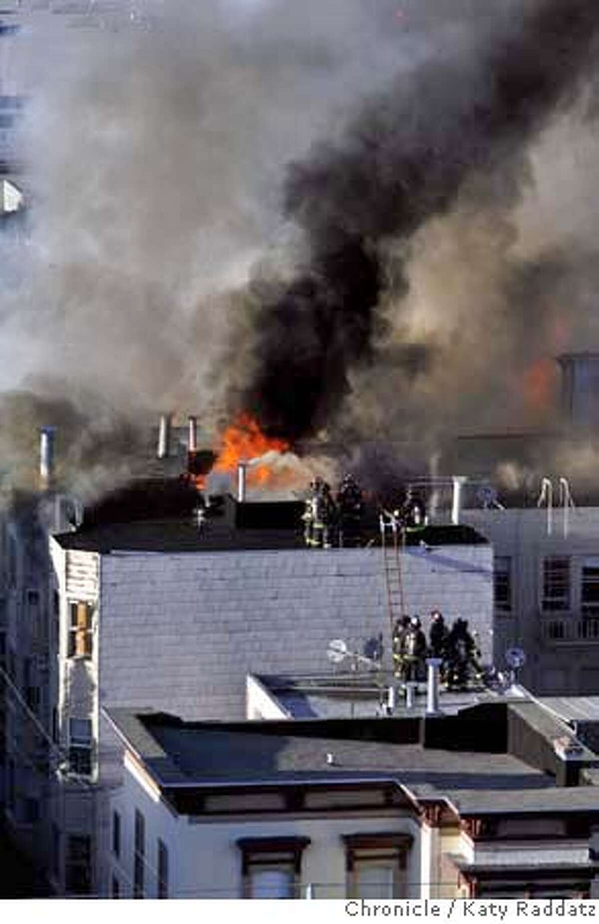 A fire that is centered at 1470 Valencia St. consumes many buildings in the 1400 block, including the Dovre Club, in San Francisco, Calif. on Monday March 17, 2008. Photo by Katy Raddatz / San Francisco Chronicle