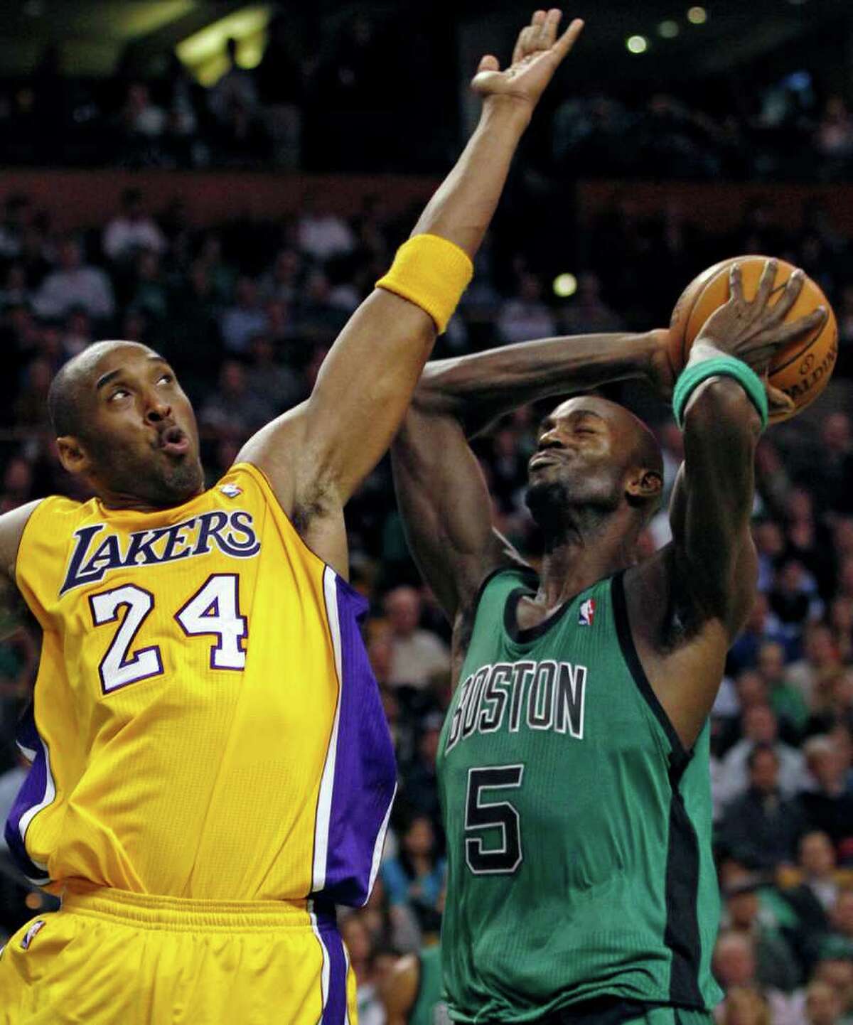 Lakers swat Celtics in OT