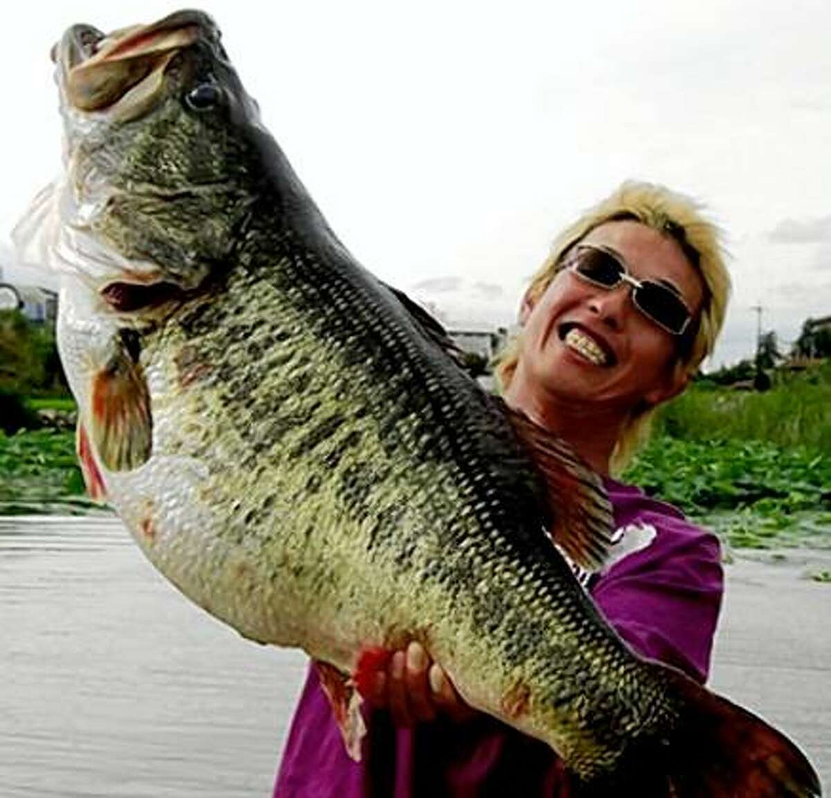 Manabu Kurita of Japan shocked the world of fishing by breaking the most cherished of all fishing records, the 75-year-old record for largemouth bass, with this bass weighing 22 pounds, 5 ounces.