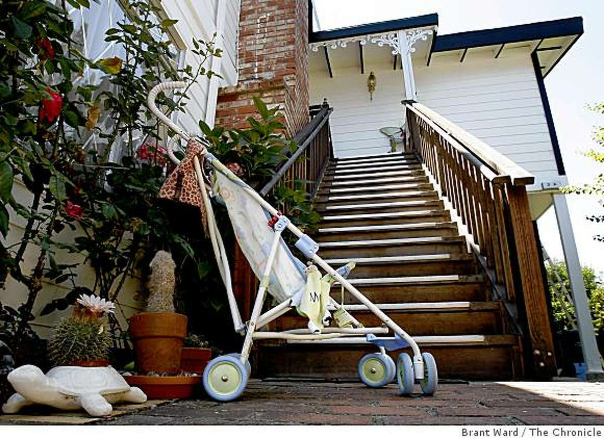 A child's s stroller sat at the bottom of the stairs that leads to the victim's home in Novato. The son of former porn king Jim Mitchell was arrested for murder of Danielle Keller and the kidnapping of his one year old daughter.