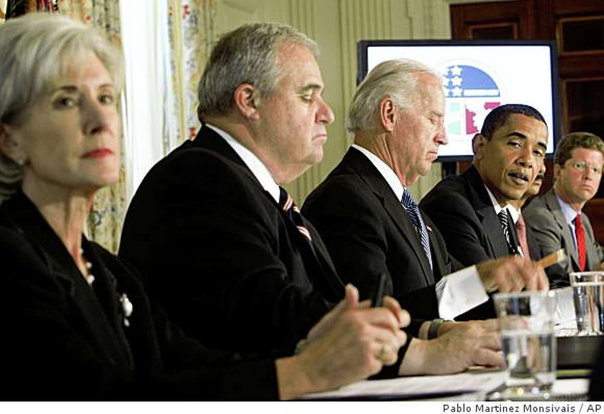 ** CORRECTS TO EDWARD DESEVE, NOT DEVANEY ** President Barack Obama, third from right, meets with his Cabinet, Monday, June 8, 2009, in the State Dining Room of the White House in Washington. From left are, Health and Human Services Secretary Kathleen Sebelius, Obama administration adviser overseeing the federal stimulus program Edward DeSeve, Vice President Joe Biden, the president, Attorney Gen. Eric Holder and Housing and Urban Development Secretary Shaun Donovan. (AP Photo/Pablo Martinez Monsivais)