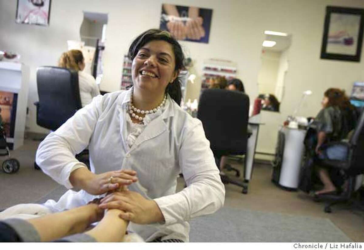 Carmen Rios doing a pedicure at her nail salon. Photo by Liz Hafalia/San Francisco Chronicle �2008, San Francisco Chronicle/ Liz Hafalia MANDATORY CREDIT FOR PHOTOG AND SAN FRANCISCO CHRONICLE. NO SALES- MAGS OUT.