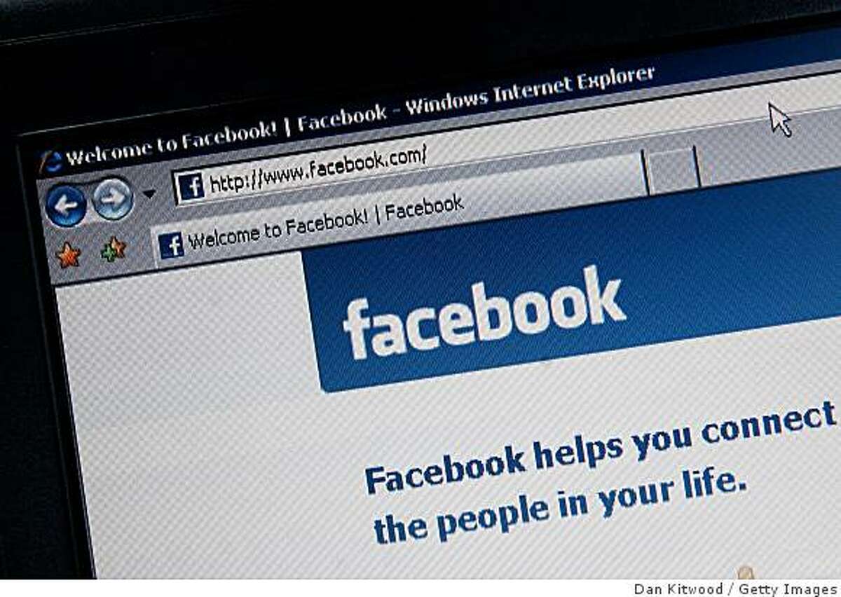 ARCH 25: In this photo illustration the Social networking site Facebook is displayed on a laptop screen on March 25, 2009 in London, England. The British government has made proposals which would force Social networking websites such as Facebook to pass on details of users, friends and contacts to help fight terrorism.