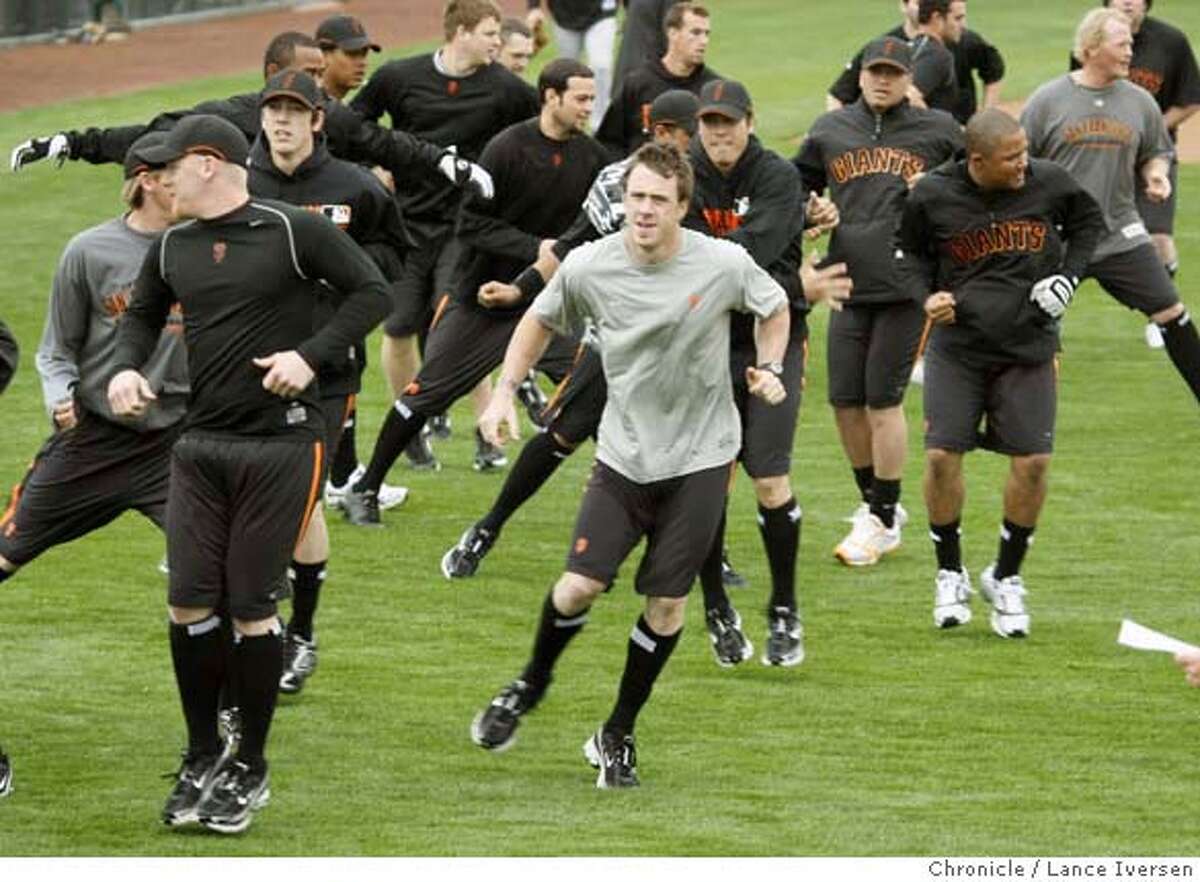 San Francisco Giants pitchers and catchers take part in running and stepping drills in the outfield at Scottsdale Stadium during their spring training baseball workout in Scottsdale, Ariz, Saturday By Lance Iversen/The San Francisco Chronicle MANDATORY CREDIT PHOTOG AND SAN FRANCISCO CHRONICLE/NO SALES MAGS OUT