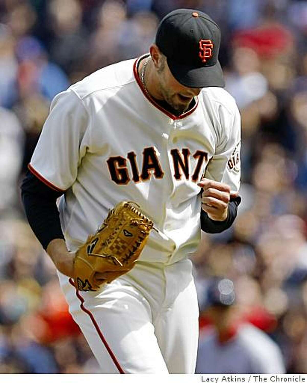 Giants pitcher Jeremy Affeldt reacts after making the third out with St. Louis Cardinal runners in a scoring position in the eighth inning keeping the Giants ahead, Sunday May 31, 2009, in San Francisco, Calif.