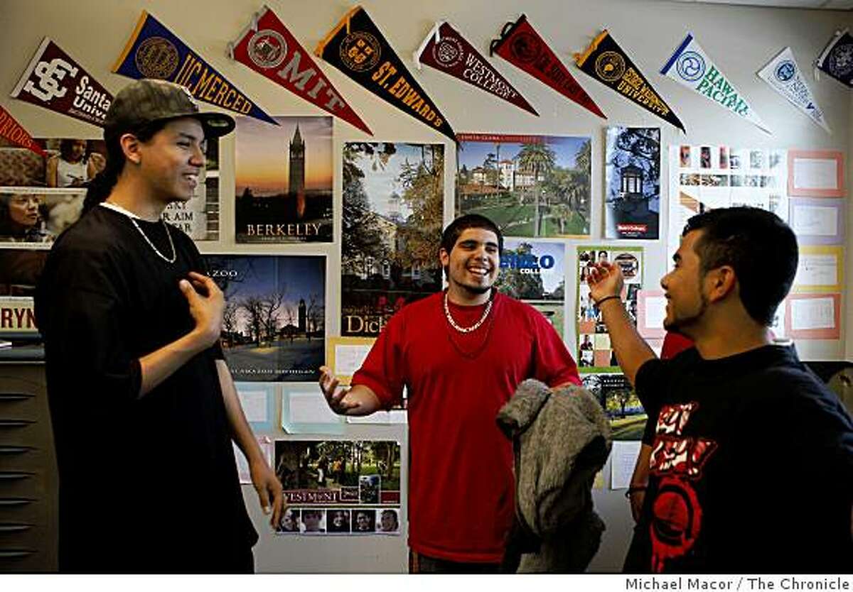 Seniors Alejandro Gutierrez (from left) talks with Victor Carranza and Andrew Cruz on the Eastside College Preparatory campus in East Palo Alto, Calif., on Tuesday, June 9, 2009.