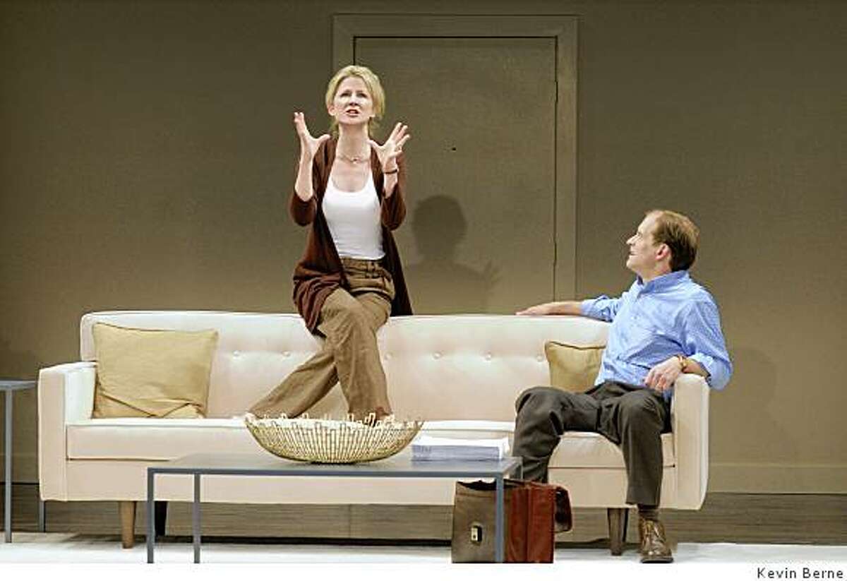 Anthony Fusco (right) as Peter has an intimate conversation with his wife Ann (Rene Augesen, Rene takes an accent / over the final e) before he heads for the park in Edward Albee's "At Home at the Zoo" at ACTl