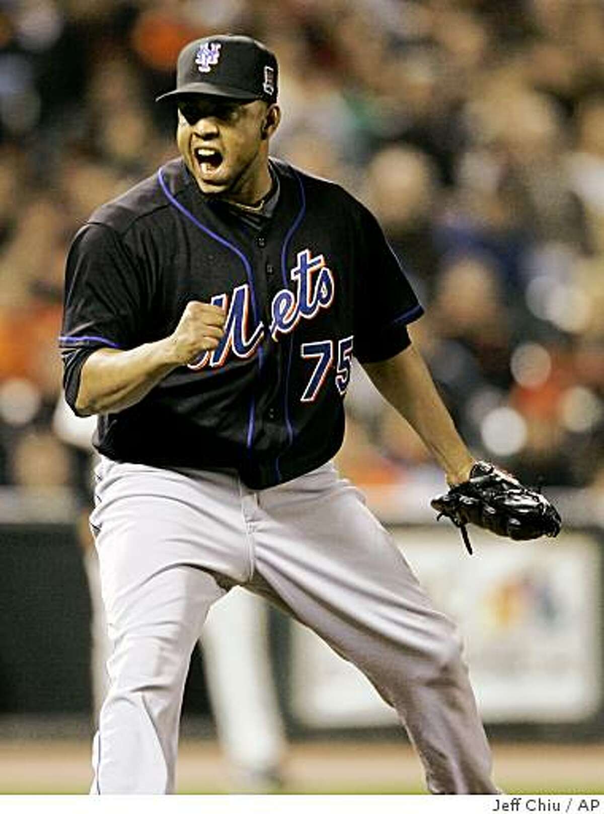 New York Mets' Francisco Rodriguez celebrates after the final out of the ninth inning of a baseball game against the San Francisco Giants in San Francisco, Friday, May 15, 2009. The Mets won 8-6. (AP Photo/Jeff Chiu)