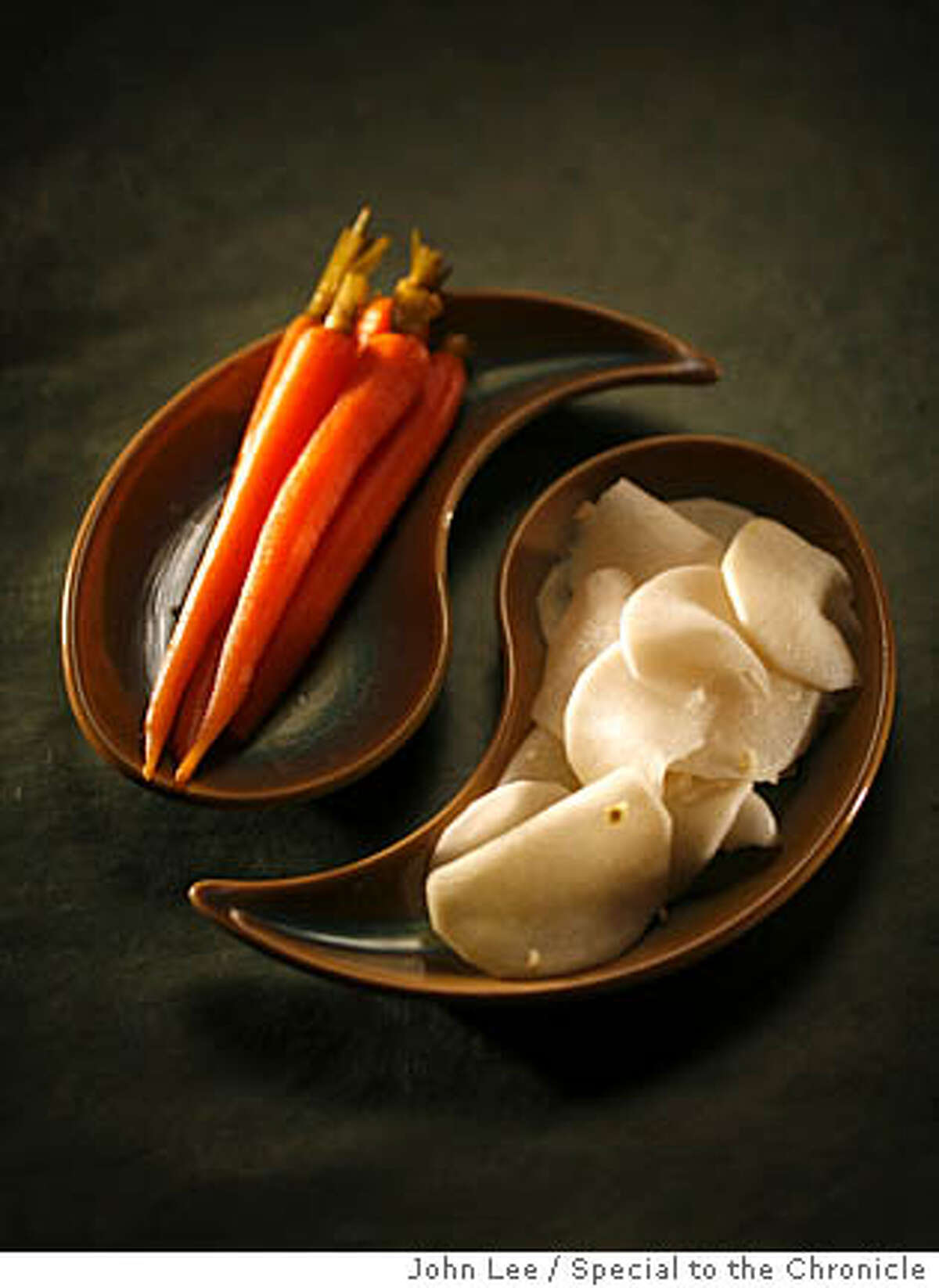 SEASONAL_30_JOHNLEE.JPG Pickle recipes for Seasonal Cook. By JOHN LEE/SPECIAL TO THE CHRONICLE Ran on: 01-30-2008 Pickled Carrots from Bar Bambino and Quick Pickled Daikon with Lemon, at right. See recipes, F4.